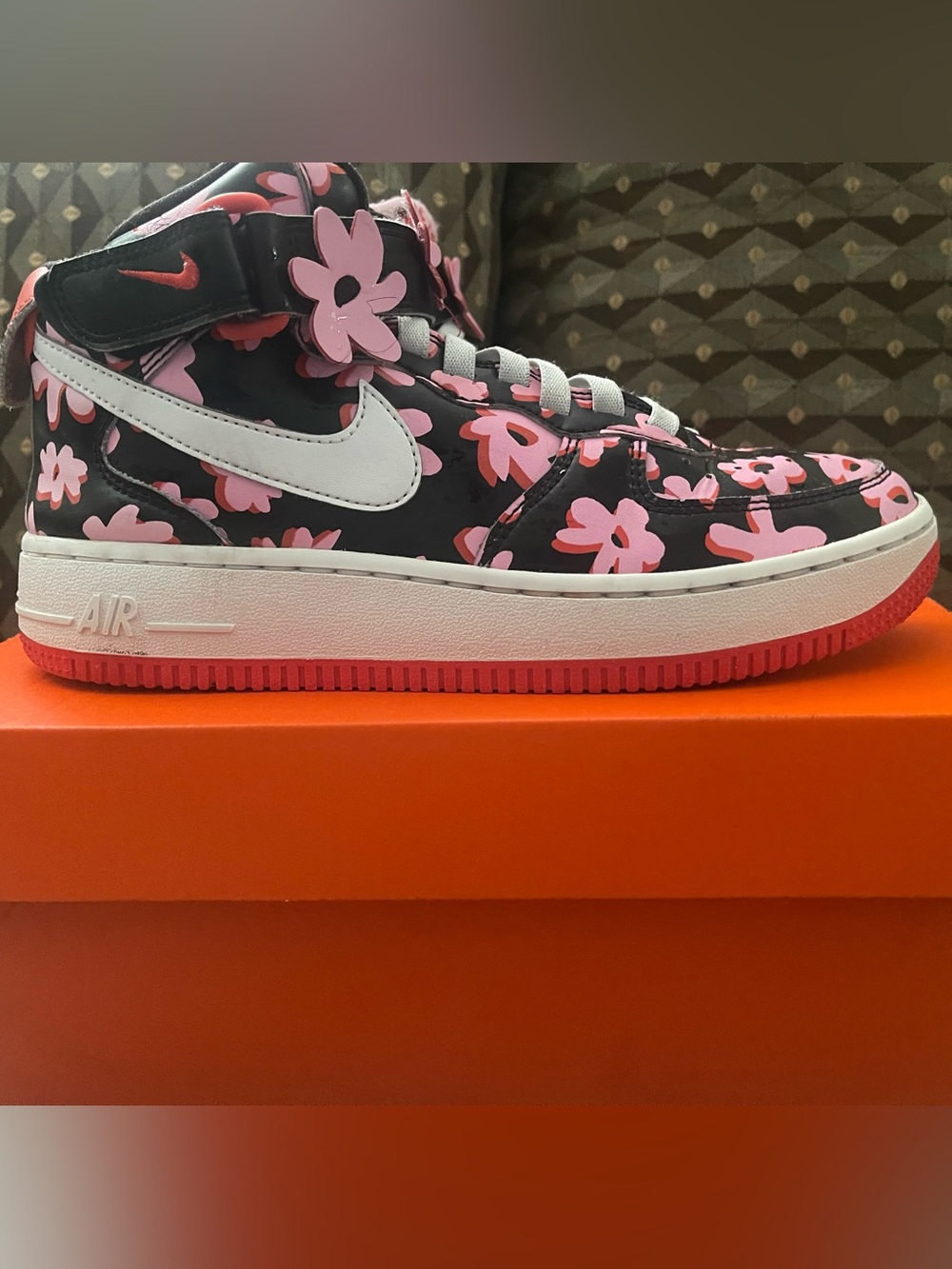 Nike Kids High-Top Sneakers Black with Pink Floral Accents and White Swoosh